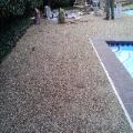 deck raised holes patched and seeded with aggregate